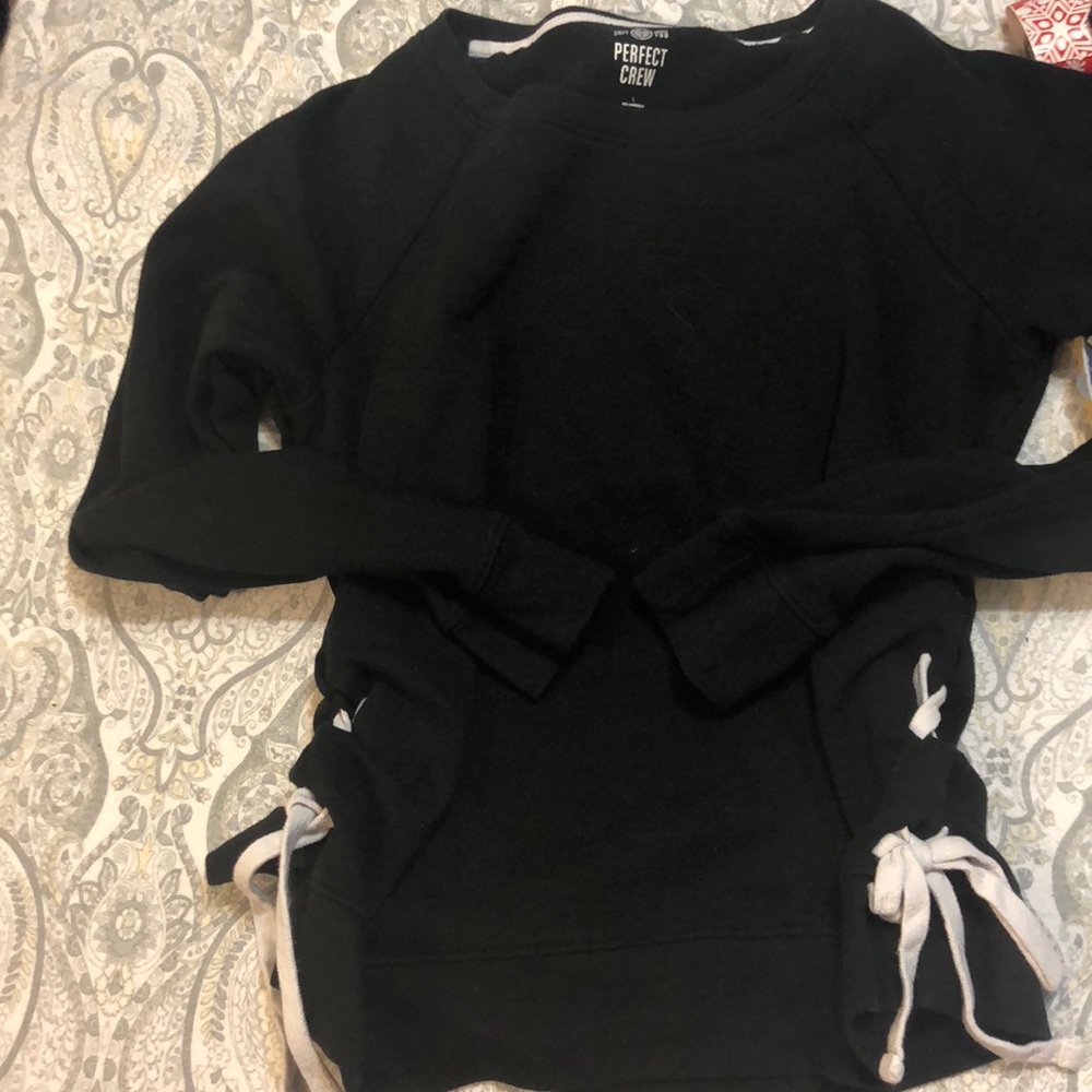 Black sweatshirt with white ties on the side